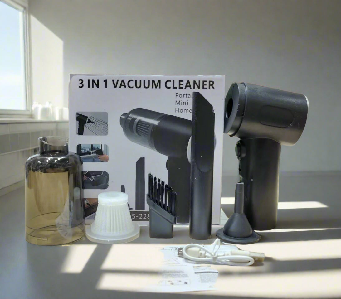3-in-1 vacuum cleaner with attachments and packaging on a table.