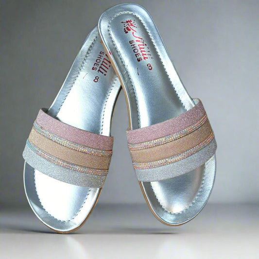 Silver sandals with multicolored straps on a black background